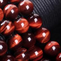 Natural Stone with Tiger Eye polished red 6mm-20mm Sold By Strand