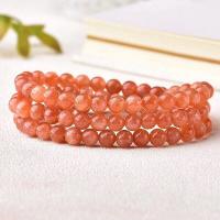 Quartz Bracelets Strawberry Quartz Round reddish orange 5mm Sold By Strand