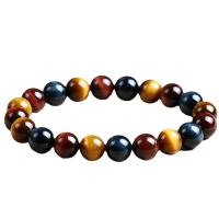 Bracelets naturelles Tiger Eye, oeil de tigre, unisexe & antifatigue, couleurs mélangées, Longueur 15 cm, Vendu par PC