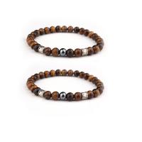 Bracelets naturelles Tiger Eye, oeil de tigre, avec hématite non magnétique & alliage de zinc, Rond, Placage de couleur argentée, élastique & unisexe, couleurs mélangées, 8mm, Longueur 7.5 pouce, Vendu par PC