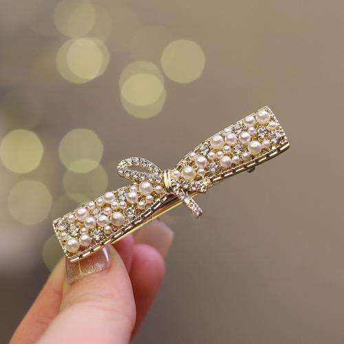 Bek Clips, Zinc Alloy, met Plastic Pearl, Strik, voor vrouw & met strass, gouden, 60x25mm, Verkocht door PC