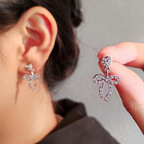 Zinc Alloy Drop Earrings Bowknot silver color plated fashion jewelry & with rhinestone silver color nickel lead & cadmium free Sold By Pair