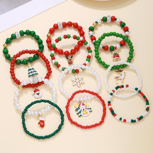 Bracelet de vacances de Noël, alliage de zinc, avec fil élastique & plastique, fait à la main, 12 pièces & Conception de Noël & styles différents pour le choix & pour femme, couleurs mélangées, Vendu par fixé